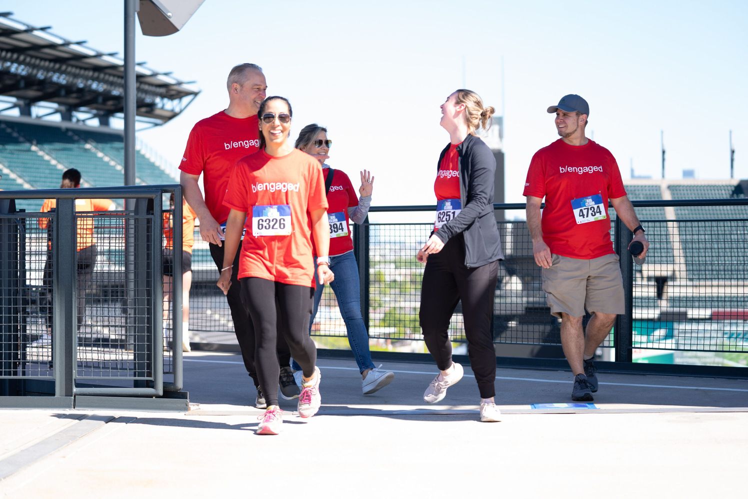 Candid photo of Ballinger associates at Eagles Stadium