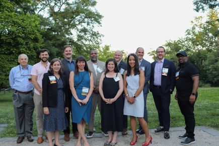 Group photo of Ballinger staff at a fundraiser