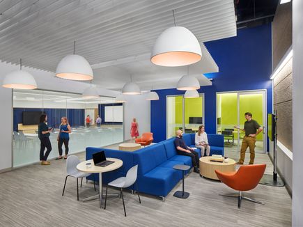 Group of people sitting in office lounge