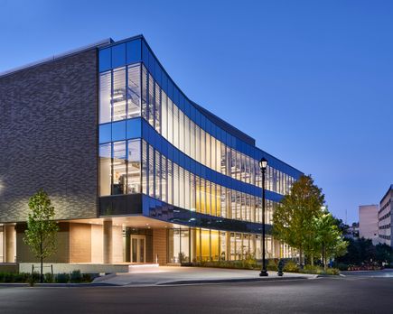 Exterior of American University building at dusk